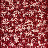 Red and white patterned fabric on a white background