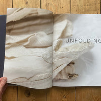 Unfolding Cloth by Hannah Lamb