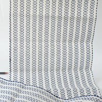 Textile with a geometric pattern on a white background