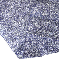Close-up of a blue and white patterned fabric