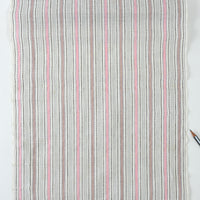Striped fabric with pink and gray lines on a white background
