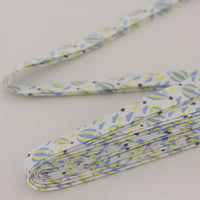 Decorative bias binding tape with blue and yellow pattern of hot air balloons.