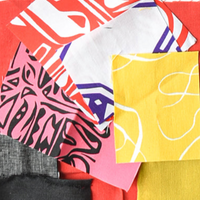 Collection of colorful fabric swatches with various patterns and colors.