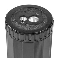 Black cylindrical container with textured top on a white background