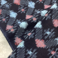 Textile with abstract pattern on a neutral background