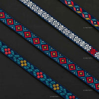 Set of colorful woven straps on a black background