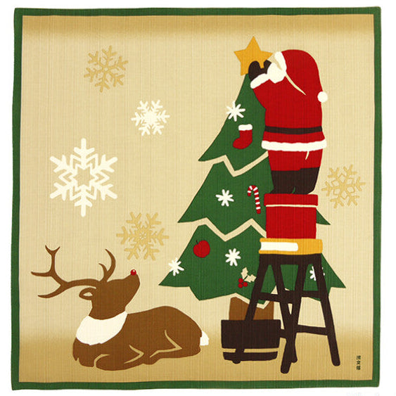 Christmas-themed furoshiki wrapping cloth with Santa Claus, reindeer, and Christmas tree design.