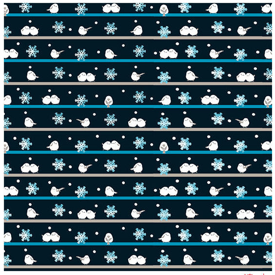 Patterned cloth with snowflakes, birds, and horizontal lines on a dark blue background.