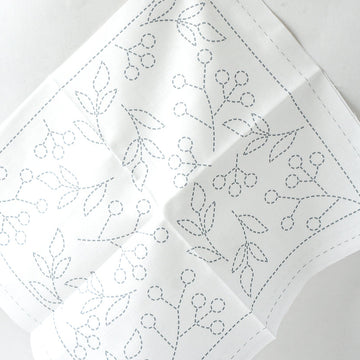 White fabric with dashed outlines for sashiko embroidery