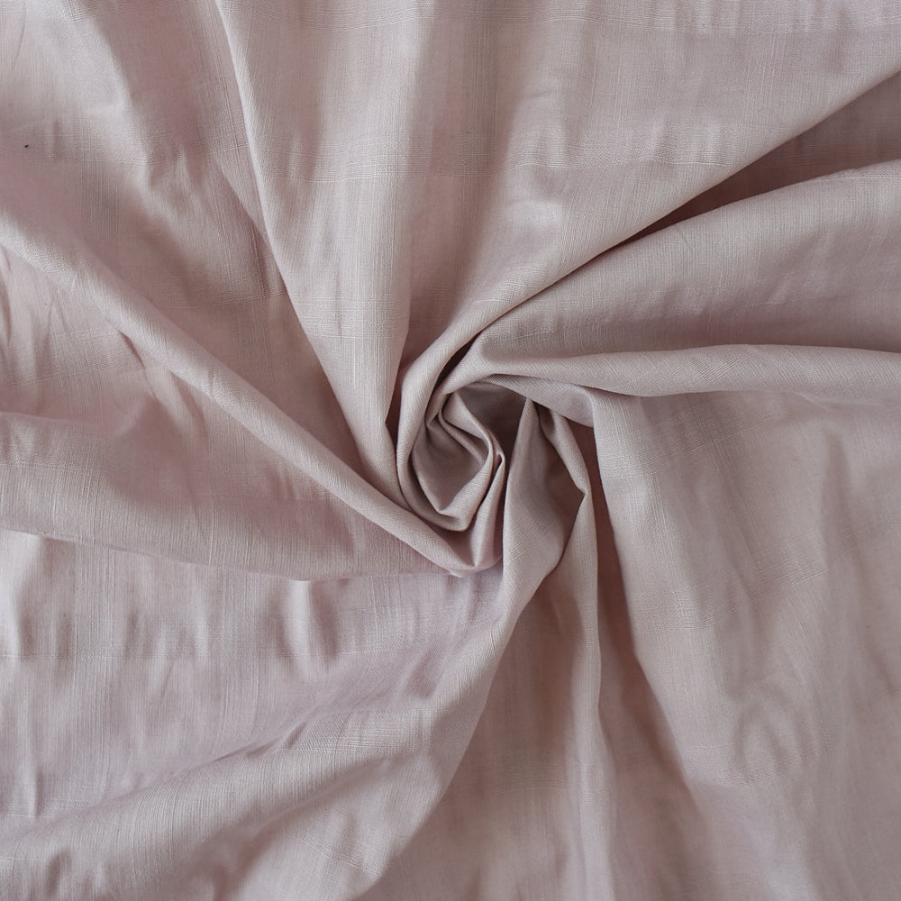 Close-up of pink fabric with folds
