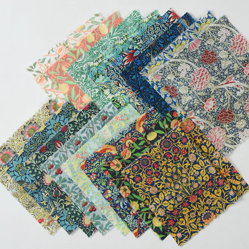 Set of fabric swatches with floral patterns on a light gray background