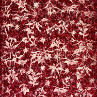 Red and white patterned fabric on a white background