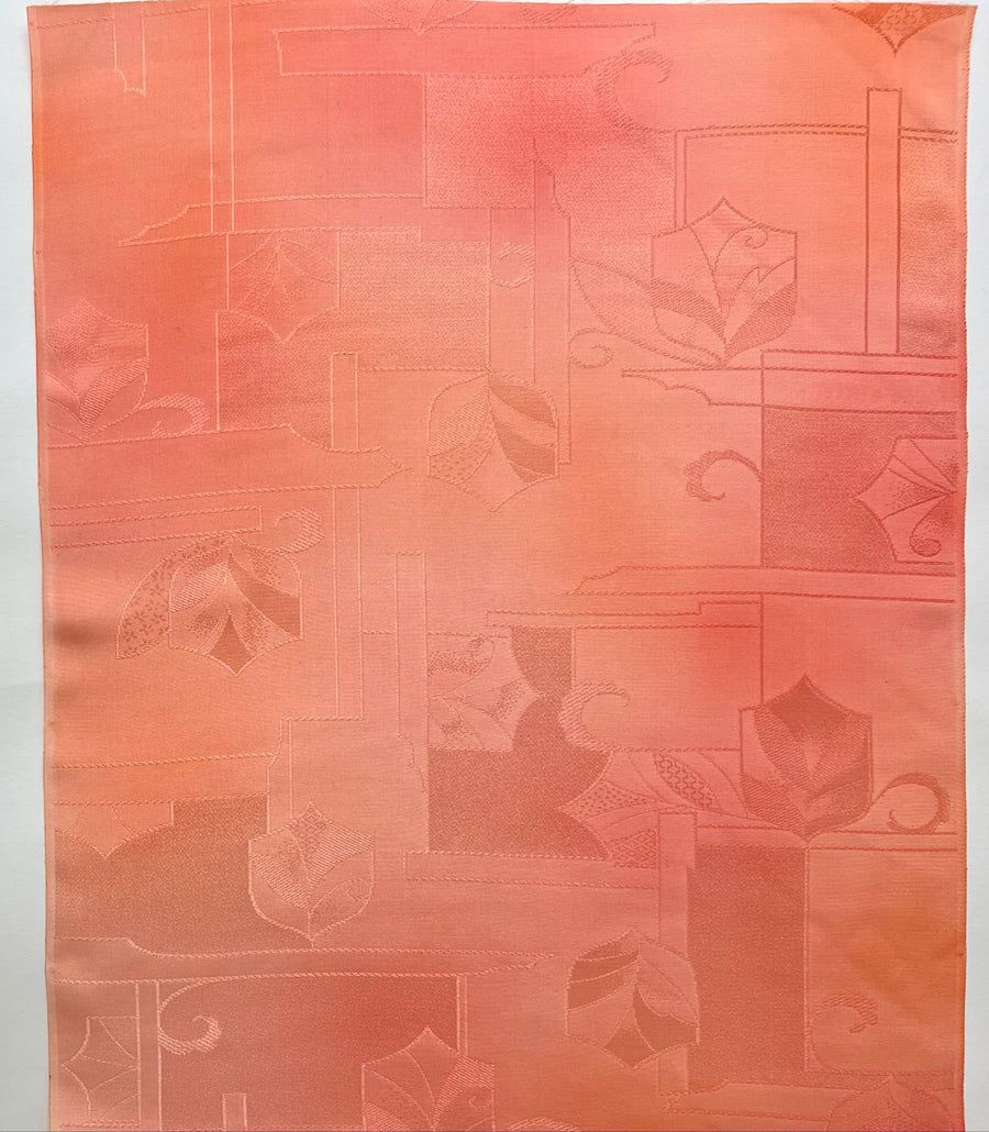Decorative fabric with geometric patterns on a plain background