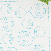 White fabric with blue bird pattern