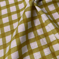 Close-up of green and pale pink checkered fabric