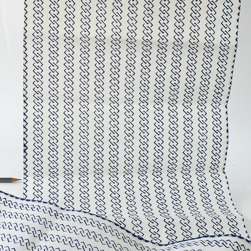 Textile with a geometric pattern on a white background