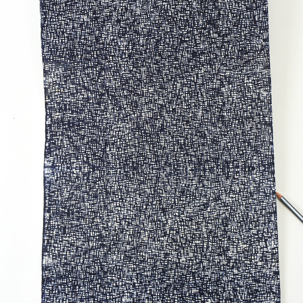 Textured black and white fabric on a white background