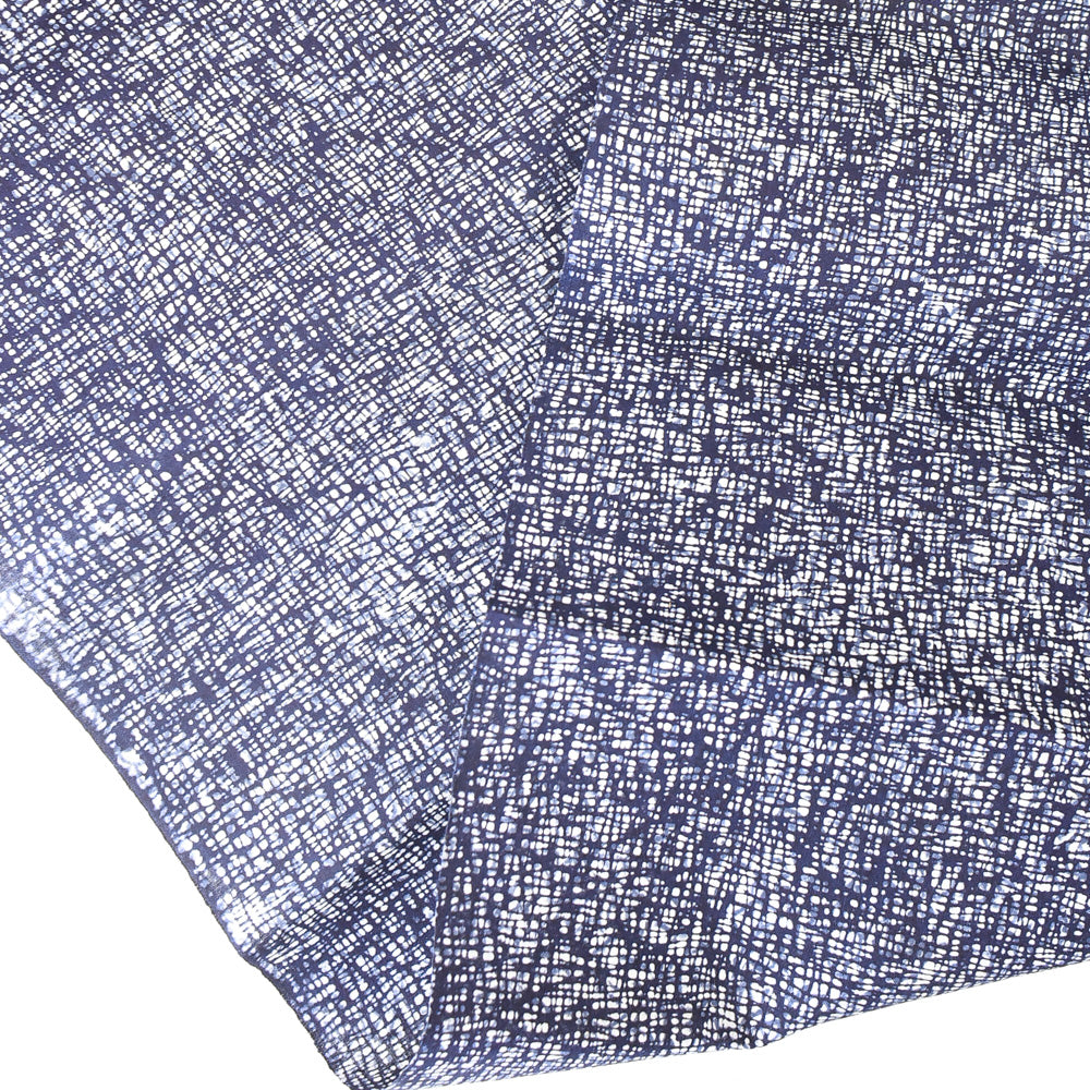 Close-up of a blue and white patterned fabric