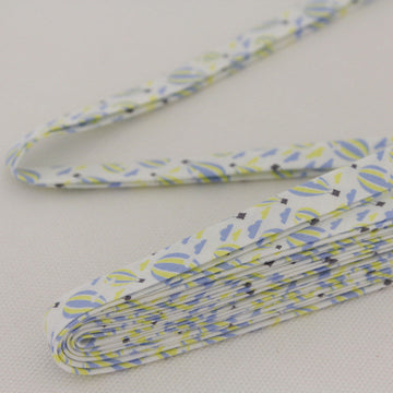 Decorative bias binding tape with blue and yellow pattern of hot air balloons.