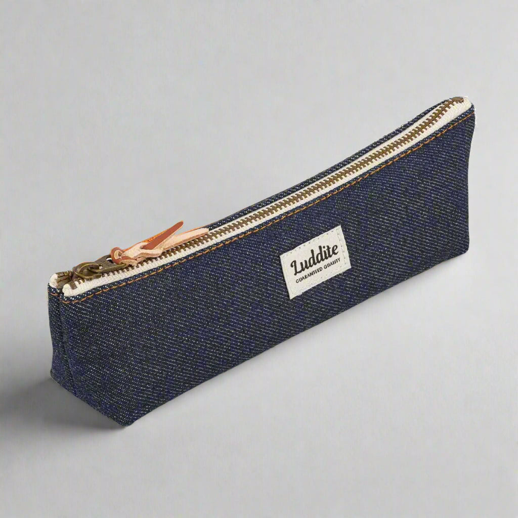 Blue pencil case with a zipper and 'Luddite' branding on a white background
