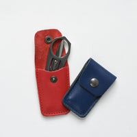 Sajou Folding Scissors, shown with leather cases in blue and red | Brooklyn Haberdashery