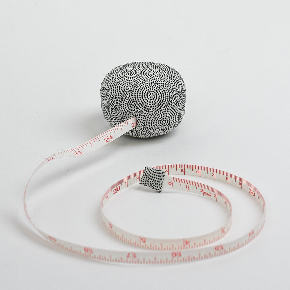 https://www.brooklynhaberdashery.com/cdn/shop/products/macaron-fabric-tape-measure-uzumasa-swirls_1100x.jpg?v=1667744164